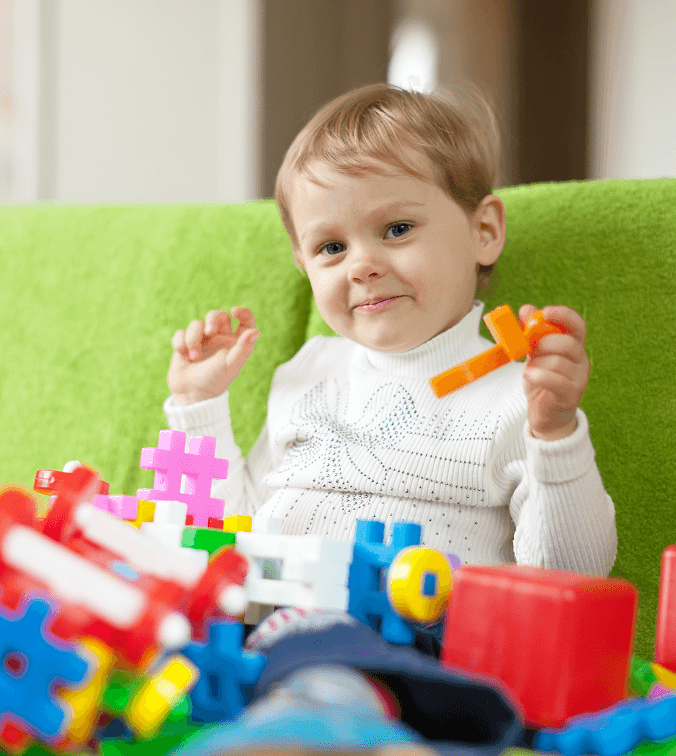 child-plays-with-toys-home