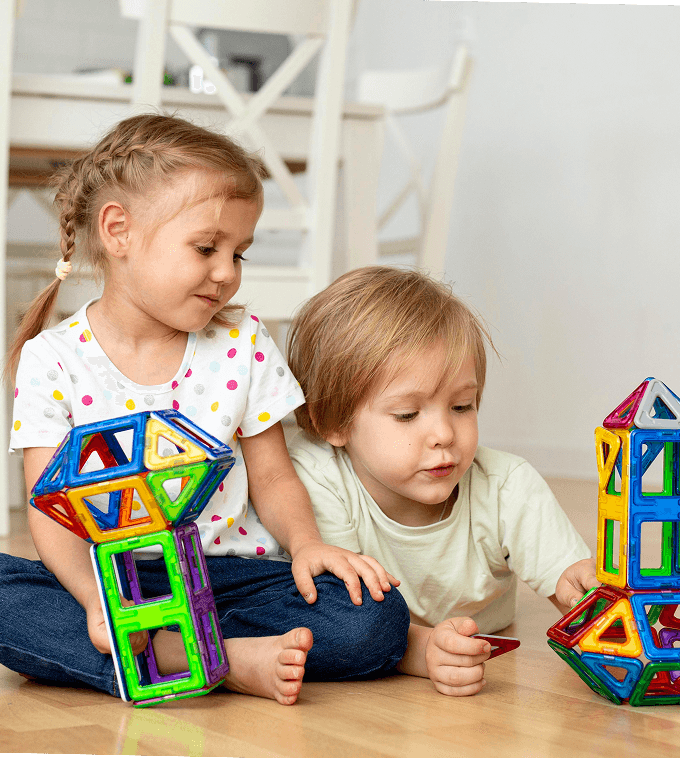 boy-girl-home-playing-with-toys-together